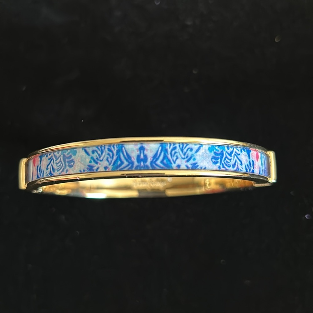 Lilly Pulitzer gold bracelet with blue and gold enamel.  Hinge opening.